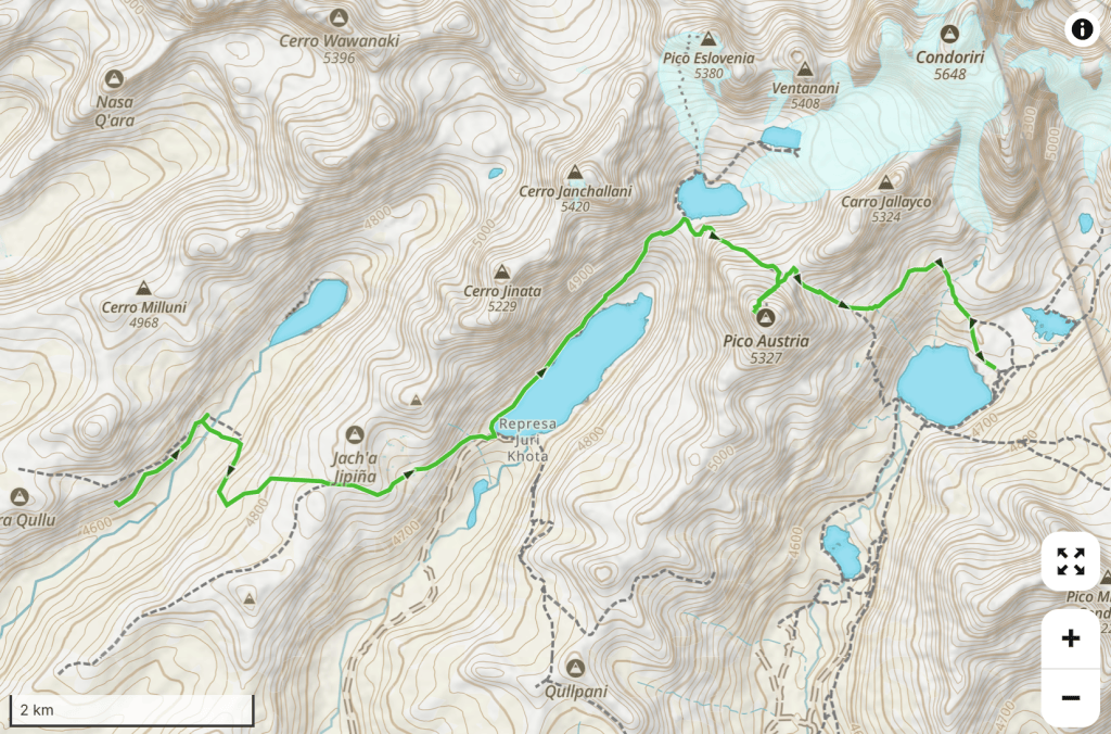 Topographic map showing a mountainous region with labeled peaks, contour lines, and a marked green hiking trail.